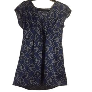 Navy blue top with a geometric pattern  Super cute with leggings!